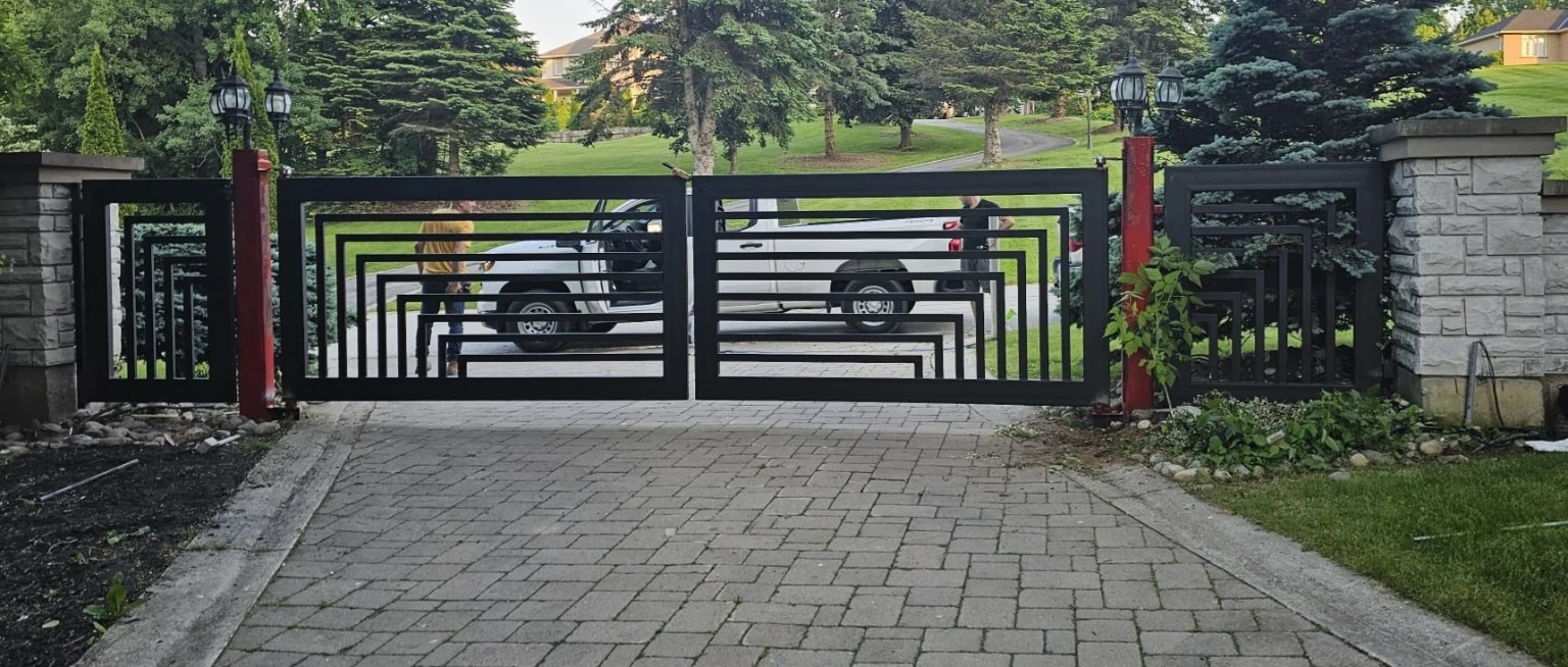 Custom driveway gate installation prepared for automated vehicle access