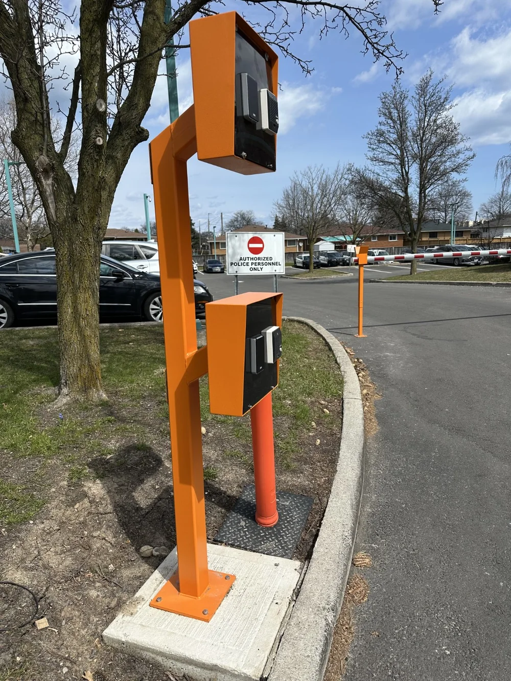 Dual-height vehicle access control pedestal with security devices and barrier gate infrastructure installed by UltraTech